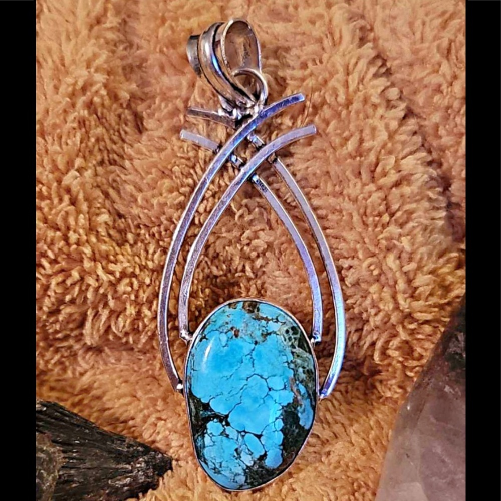 Turquoise and sterling silver pendant